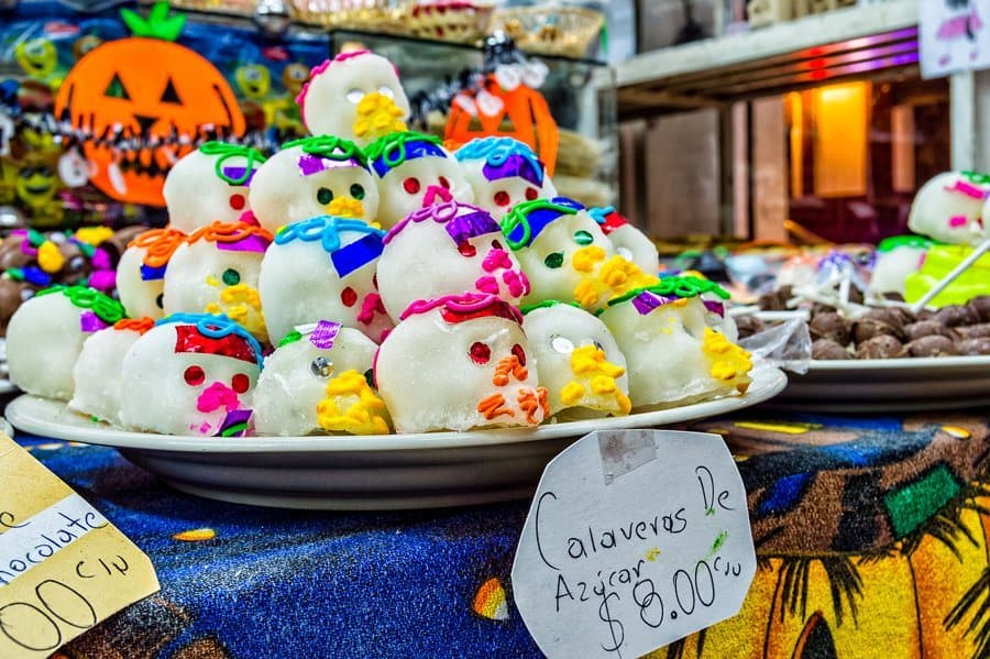 Sugar skulls… and a Halloween pumpkin in the background